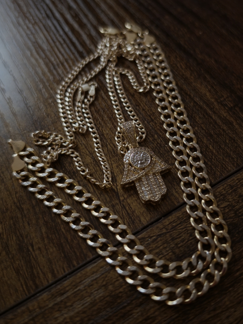 10k Gold Hamsa Hand Pendant Natural Diamonds, 10k Necklac, plus 2 10k Bracelets.
